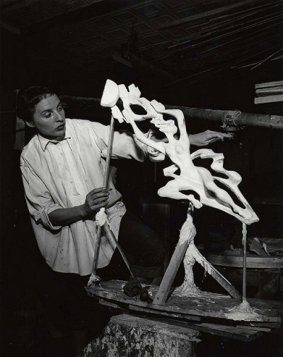 Gwen Lux, American sculptor and designer, 1908-1986, in her studio