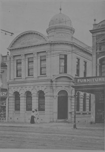 Looking north, showing the premises of F Prime (extreme right), J Martin, dentist, and the National Bank of New Zealand (centre), Record ID, 7-A4489, Auckland City Library